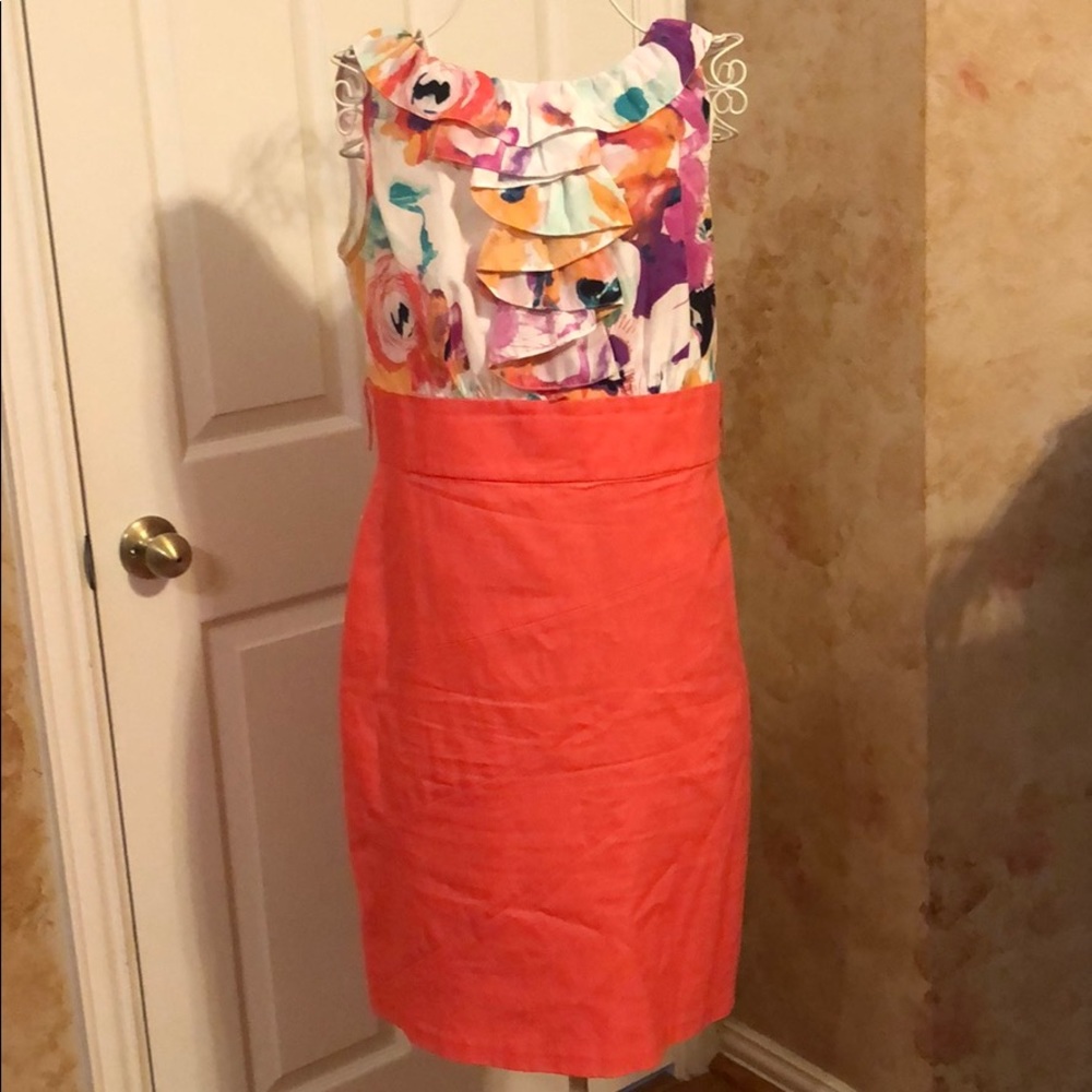 Women’s floral sheath dress with ruffles.